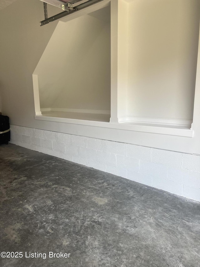 9403 Alex Ct, Louisville, KY 40299 - detailed view of concrete block wall and concrete flooring