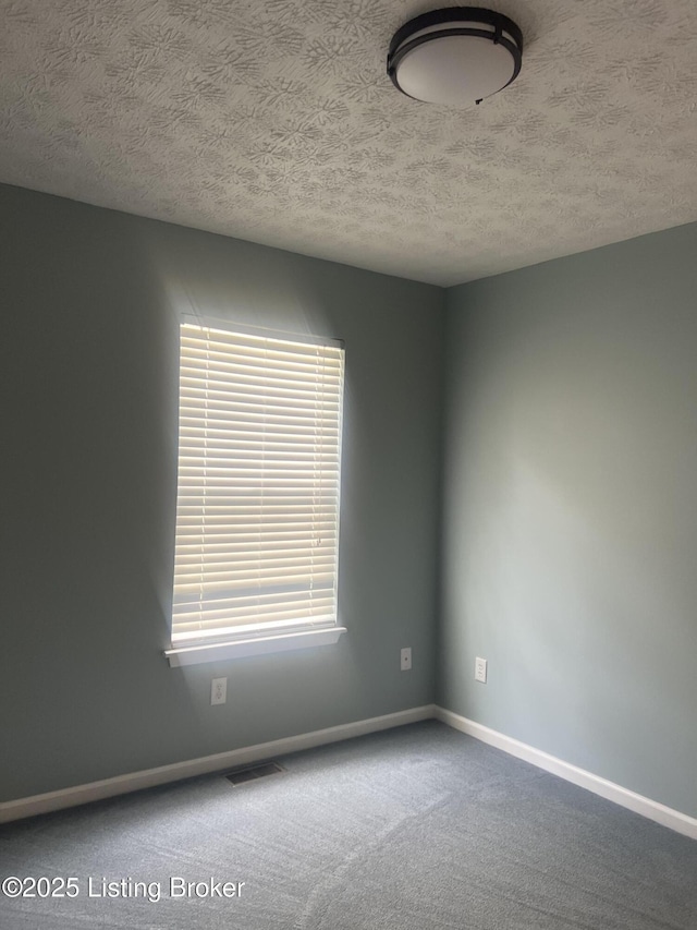 9403 Alex Ct, Louisville, KY 40299 - spare room with carpet flooring and a textured ceiling