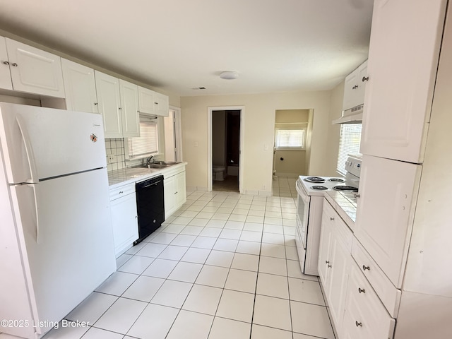 934 Palatka Rd, Louisville, KY 40214 - kitchen featuring white appliances, under cabinet range hood, light countertops, and white cabinetry