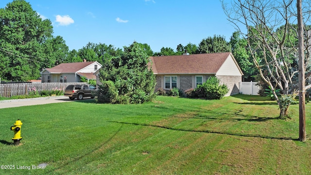 1291 Lipps Ln, Louisville, KY 40219 - view of front of home featuring brick siding and concrete driveway