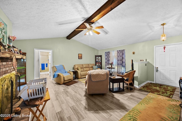1291 Lipps Ln, Louisville, KY 40219 - living room with a textured ceiling, light wood finished floors, a brick fireplace, and a ceiling fan