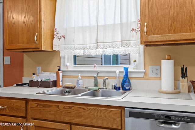 1291 Lipps Ln, Louisville, KY 40219 - kitchen featuring stainless steel dishwasher, light countertops, and brown cabinetry