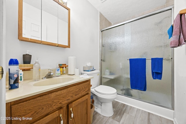 1291 Lipps Ln, Louisville, KY 40219 - full bathroom featuring vanity, a shower stall, and wood finished floors