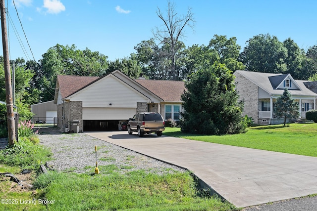 1291 Lipps Ln, Louisville, KY 40219 - single story home featuring brick siding, an attached garage, driveway, and a front lawn