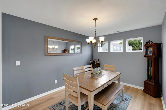 124 Shadow Rock Ct, Shepherdsville, KY 40165 - dining area featuring a chandelier and light wood-type flooring