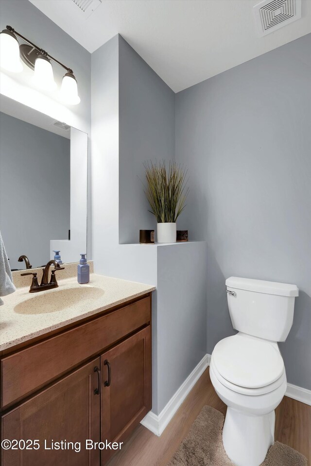 124 Shadow Rock Ct, Shepherdsville, KY 40165 - half bath with wood finished floors and vanity