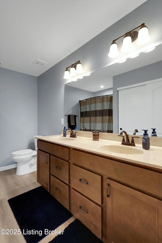124 Shadow Rock Ct, Shepherdsville, KY 40165 - bathroom with double vanity, wood finished floors, and a shower with curtain