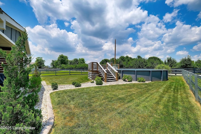 124 Shadow Rock Ct, Shepherdsville, KY 40165 - fenced backyard with stairway, a pool, and a deck