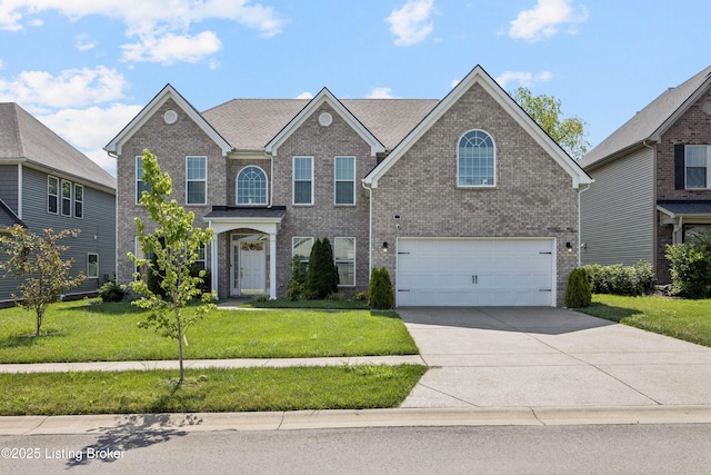 14433 Halden Ridge Way, Louisville, KY 40245 - traditional home featuring a garage, brick siding, concrete driveway, and a front yard