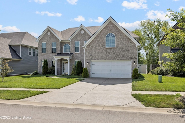 14433 Halden Ridge Way, Louisville, KY 40245 - traditional-style house featuring a garage, brick siding, and concrete driveway