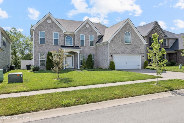 14433 Halden Ridge Way, Louisville, KY 40245 - traditional-style home featuring an attached garage, concrete driveway, brick siding, and a front yard