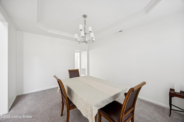 14433 Halden Ridge Way, Louisville, KY 40245 - carpeted dining room with a tray ceiling, a chandelier, and ornamental molding