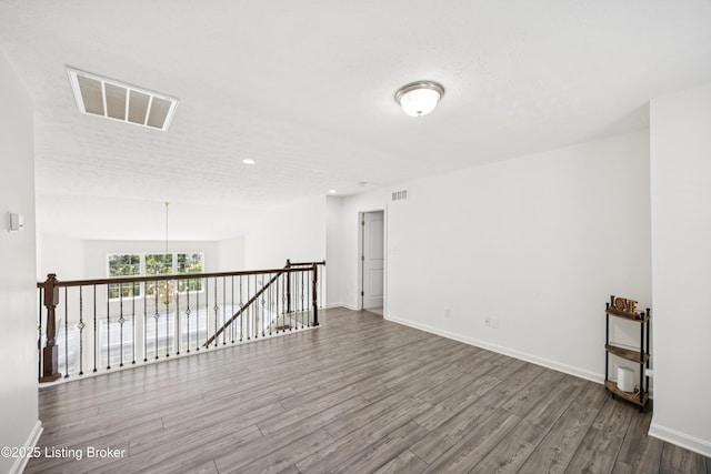 14433 Halden Ridge Way, Louisville, KY 40245 - spare room with wood finished floors and recessed lighting