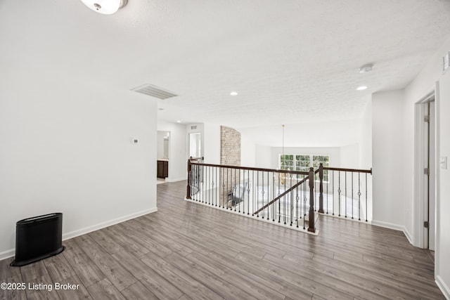 14433 Halden Ridge Way, Louisville, KY 40245 - empty room featuring wood finished floors, a smoke detector, and recessed lighting