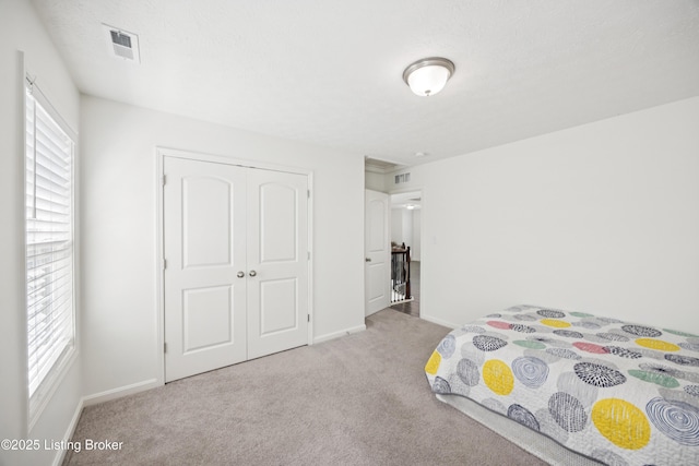 14433 Halden Ridge Way, Louisville, KY 40245 - carpeted bedroom with baseboards and a closet