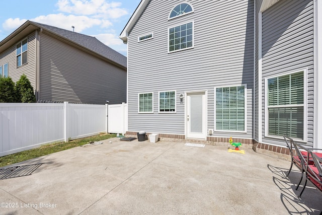 14433 Halden Ridge Way, Louisville, KY 40245 - fenced backyard featuring a patio