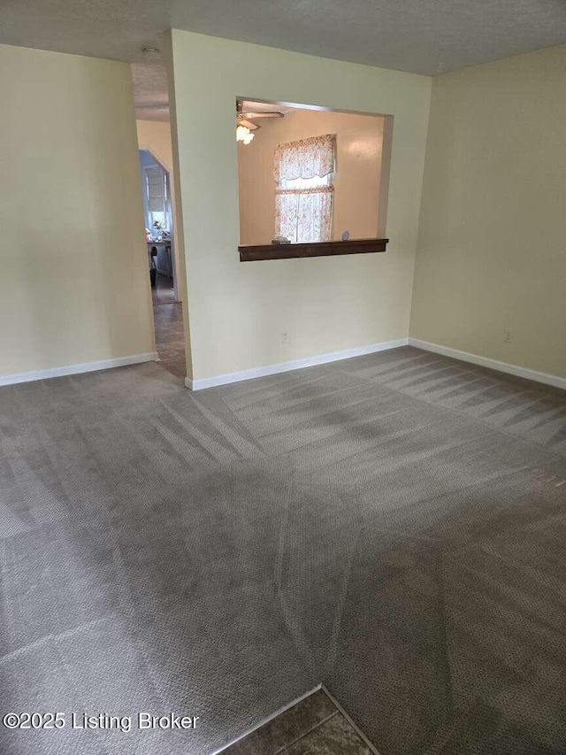 9907 Plaudit Way, Louisville, KY 40272 - spare room with dark colored carpet and baseboards