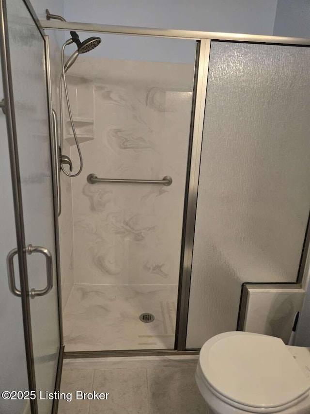 9907 Plaudit Way, Louisville, KY 40272 - bathroom featuring a stall shower and tile patterned flooring