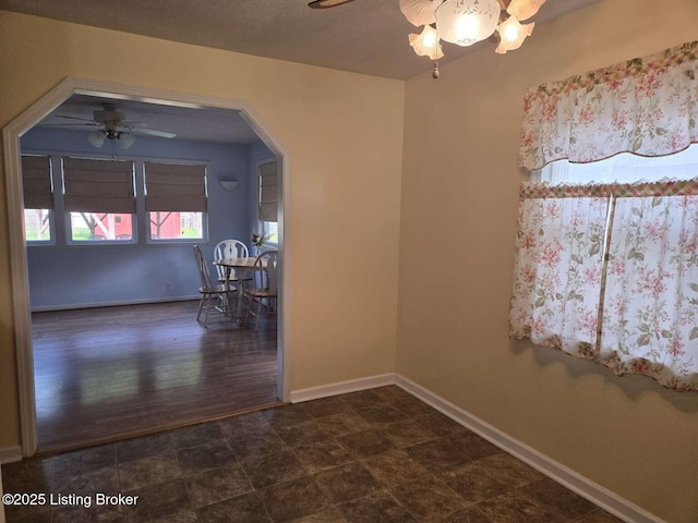9907 Plaudit Way, Louisville, KY 40272 - spare room featuring ceiling fan and arched walkways