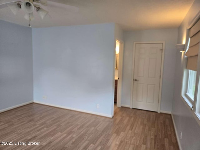 9907 Plaudit Way, Louisville, KY 40272 - spare room with wood finished floors and ceiling fan