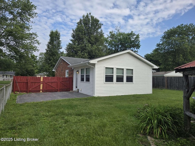 9907 Plaudit Way, Louisville, KY 40272 - rear view of house featuring a gate, a patio, and a fenced backyard