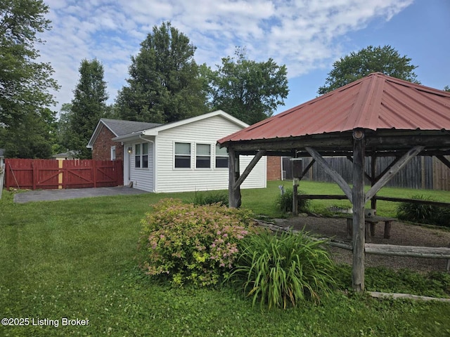 9907 Plaudit Way, Louisville, KY 40272 - view of home's exterior featuring a gate and brick siding