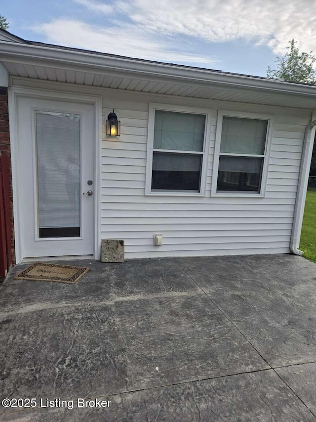 9907 Plaudit Way, Louisville, KY 40272 - doorway to property featuring a patio area