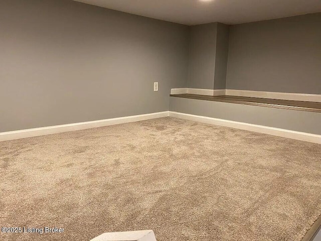1214 Logan St, Louisville, KY 40204 - unfurnished room with carpet floors and baseboards