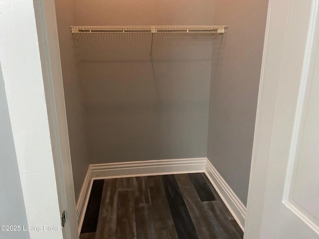 1214 Logan St, Louisville, KY 40204 - walk in closet with wood finished floors