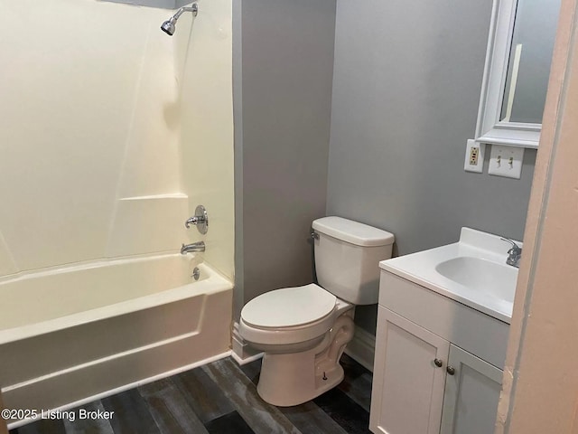 1214 Logan St, Louisville, KY 40204 - bathroom with vanity, washtub / shower combination, and wood finished floors
