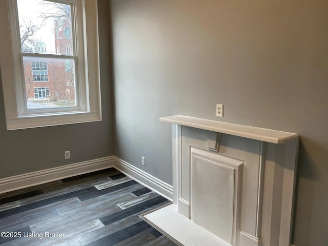 1214 Logan St, Louisville, KY 40204 - detailed view of wood finished floors and baseboards