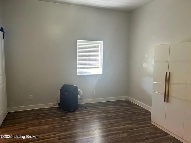 1214 Logan St, Louisville, KY 40204 - empty room featuring dark wood-style floors