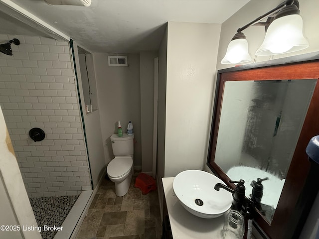 304 S 41st St, Louisville, KY 40212 - full bath featuring a shower stall, vanity, and stone finish flooring