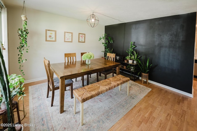 6812 Holly Lake Dr, Louisville, KY 40291 - dining space with light wood-style flooring and baseboards