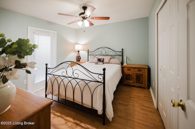 6812 Holly Lake Dr, Louisville, KY 40291 - bedroom with a closet, light wood-style flooring, and ceiling fan