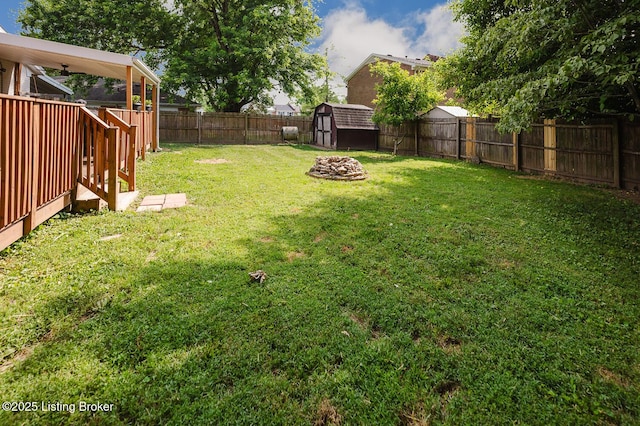 6812 Holly Lake Dr, Louisville, KY 40291 - fenced backyard with a storage unit