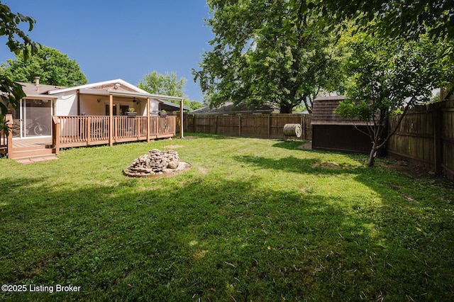 6812 Holly Lake Dr, Louisville, KY 40291 - fenced backyard with a ceiling fan, a shed, and a deck