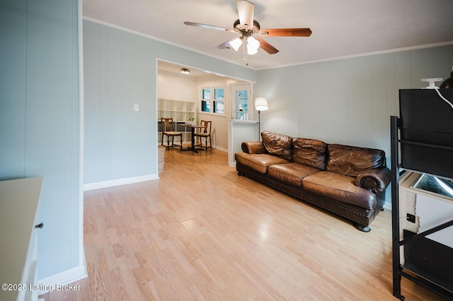6812 Holly Lake Dr, Louisville, KY 40291 - living room featuring a ceiling fan, light wood-style floors, and ornamental molding