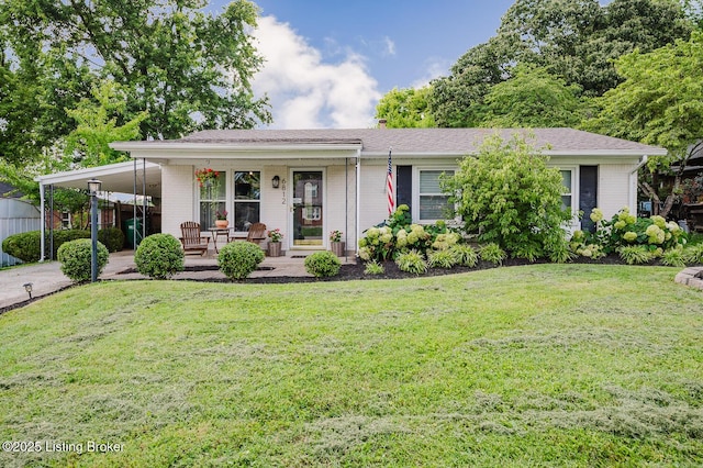 6812 Holly Lake Dr, Louisville, KY 40291 - view of front facade with a porch, a front yard, a carport, driveway, and brick siding