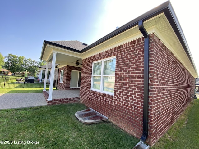 7508 Pavilion Park Rd, Louisville, KY 40214 - view of side of property with a ceiling fan and brick siding