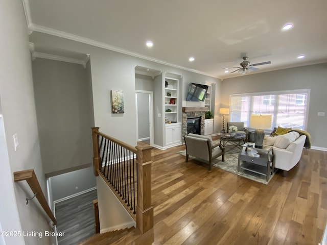 7508 Pavilion Park Rd, Louisville, KY 40214 - living room with hardwood / wood-style flooring, a ceiling fan, crown molding, a fireplace, and recessed lighting