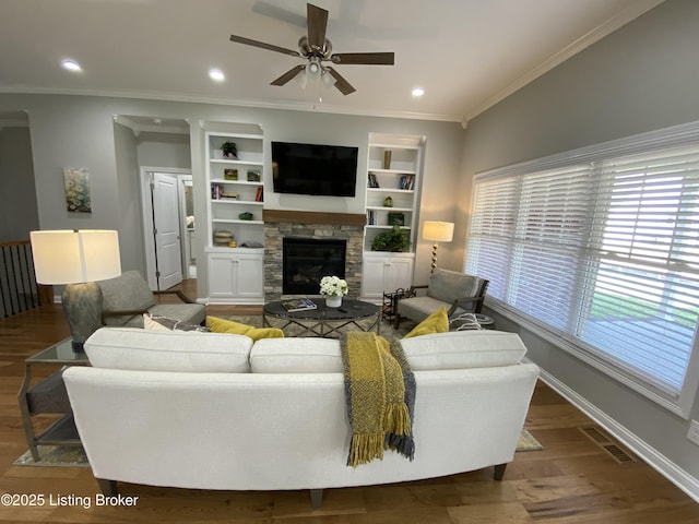 7508 Pavilion Park Rd, Louisville, KY 40214 - living room featuring a ceiling fan, crown molding, a fireplace, wood finished floors, and recessed lighting