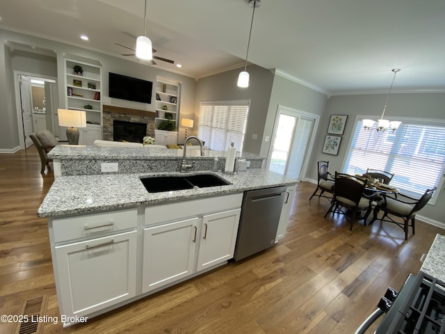 7508 Pavilion Park Rd, Louisville, KY 40214 - kitchen featuring dishwasher, ornamental molding, ceiling fan, a fireplace, and hanging light fixtures