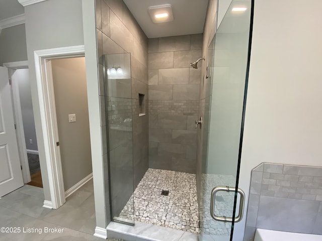 7508 Pavilion Park Rd, Louisville, KY 40214 - full bath featuring a shower stall, crown molding, tile patterned floors, and a bath