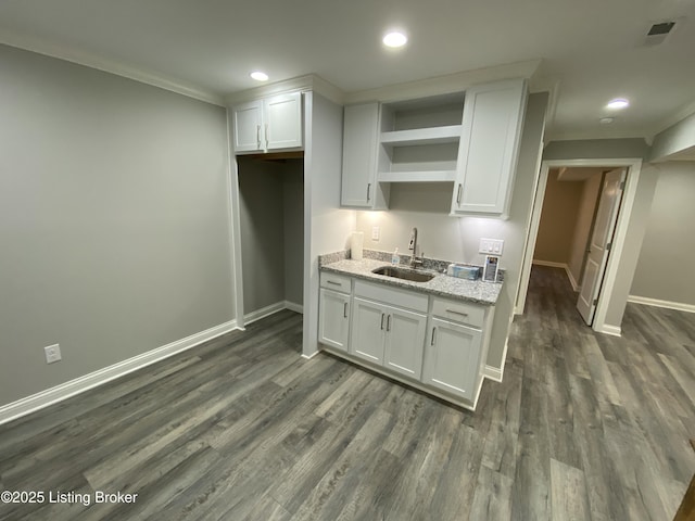 7508 Pavilion Park Rd, Louisville, KY 40214 - kitchen with open shelves, white cabinetry, dark wood finished floors, recessed lighting, and light stone counters