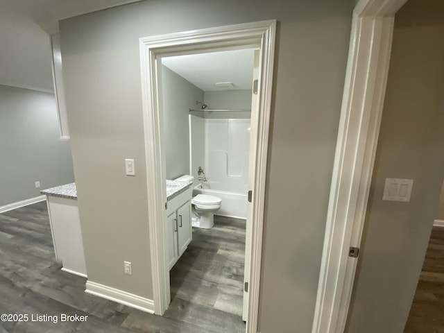 7508 Pavilion Park Rd, Louisville, KY 40214 - full bathroom with vanity, wood finished floors, and washtub / shower combination