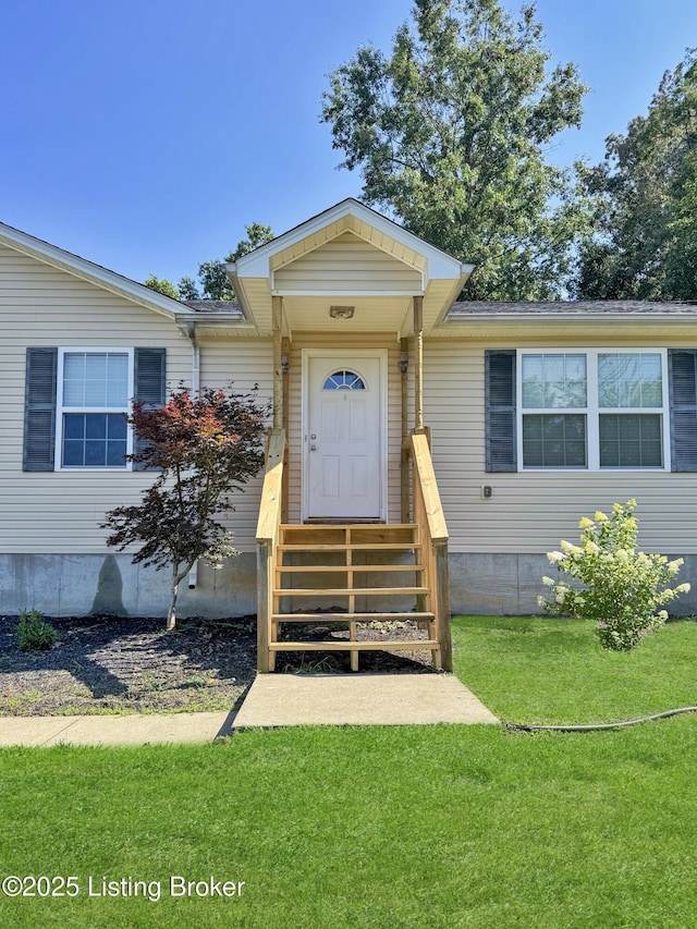 599 Ritchie Dr, Brandenburg, KY 40108 - doorway to property featuring a yard