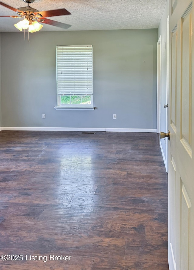 599 Ritchie Dr, Brandenburg, KY 40108 - empty room with ceiling fan, a textured ceiling, and dark wood finished floors