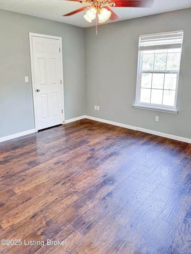 599 Ritchie Dr, Brandenburg, KY 40108 - spare room with a ceiling fan and dark wood-style floors