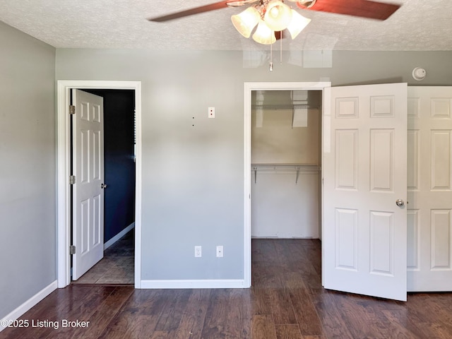 599 Ritchie Dr, Brandenburg, KY 40108 - unfurnished bedroom with a closet, a textured ceiling, wood finished floors, and ceiling fan